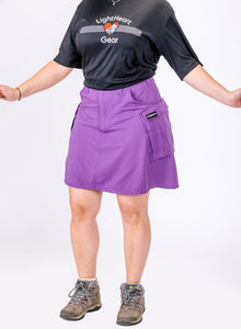 Large a-line hiking skirt with pockets for women shown on size large model. 