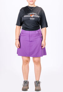 Front view of a-line pink hiking skirt with pockets.