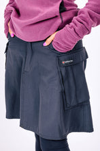 Water repellent a-line hiking skirt with multiple pockets.